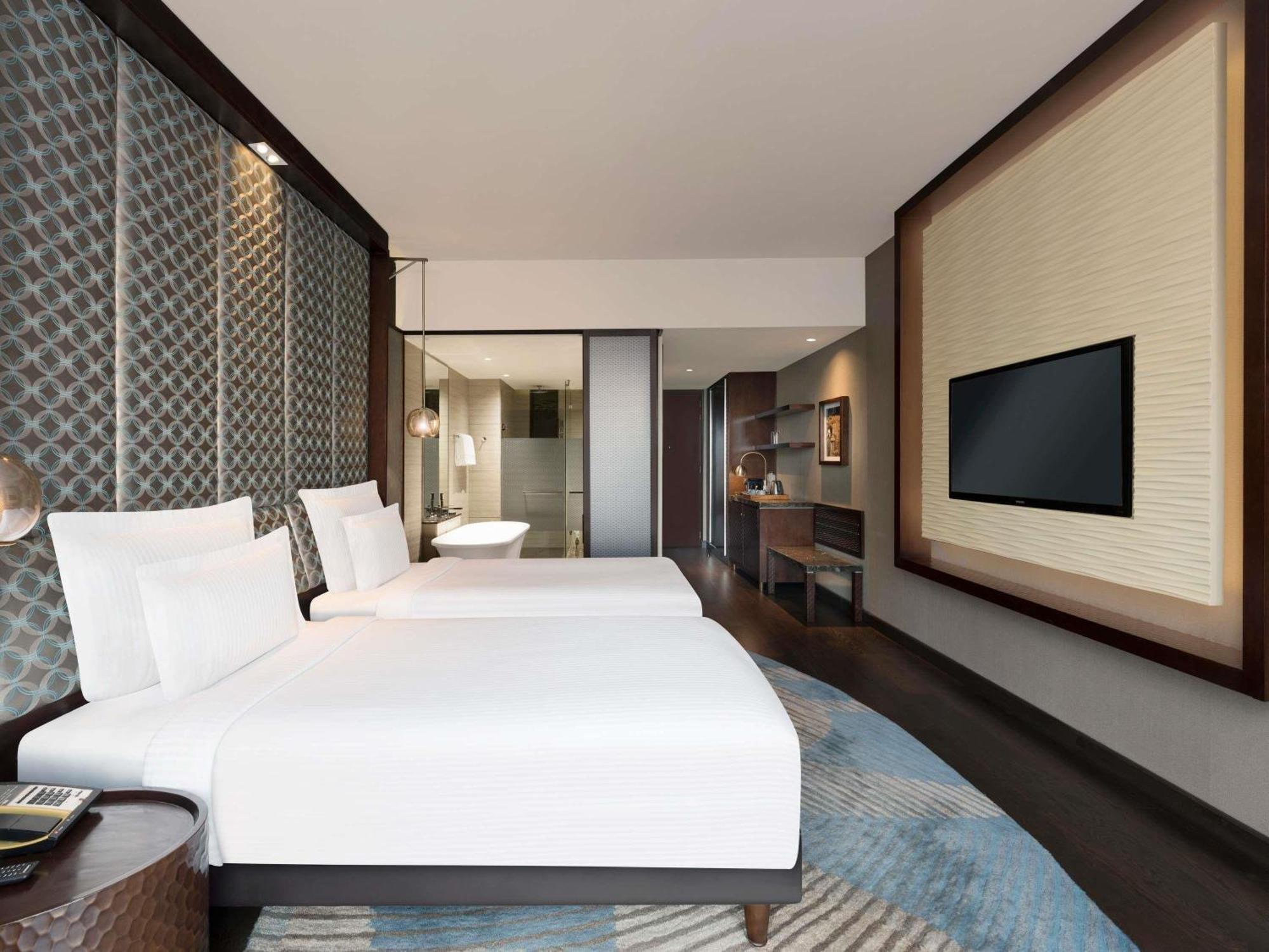 Executive Twin Room City Side on food beverages spa laundry | Complimentary one way airport transfer | Lounge access cocktail hours